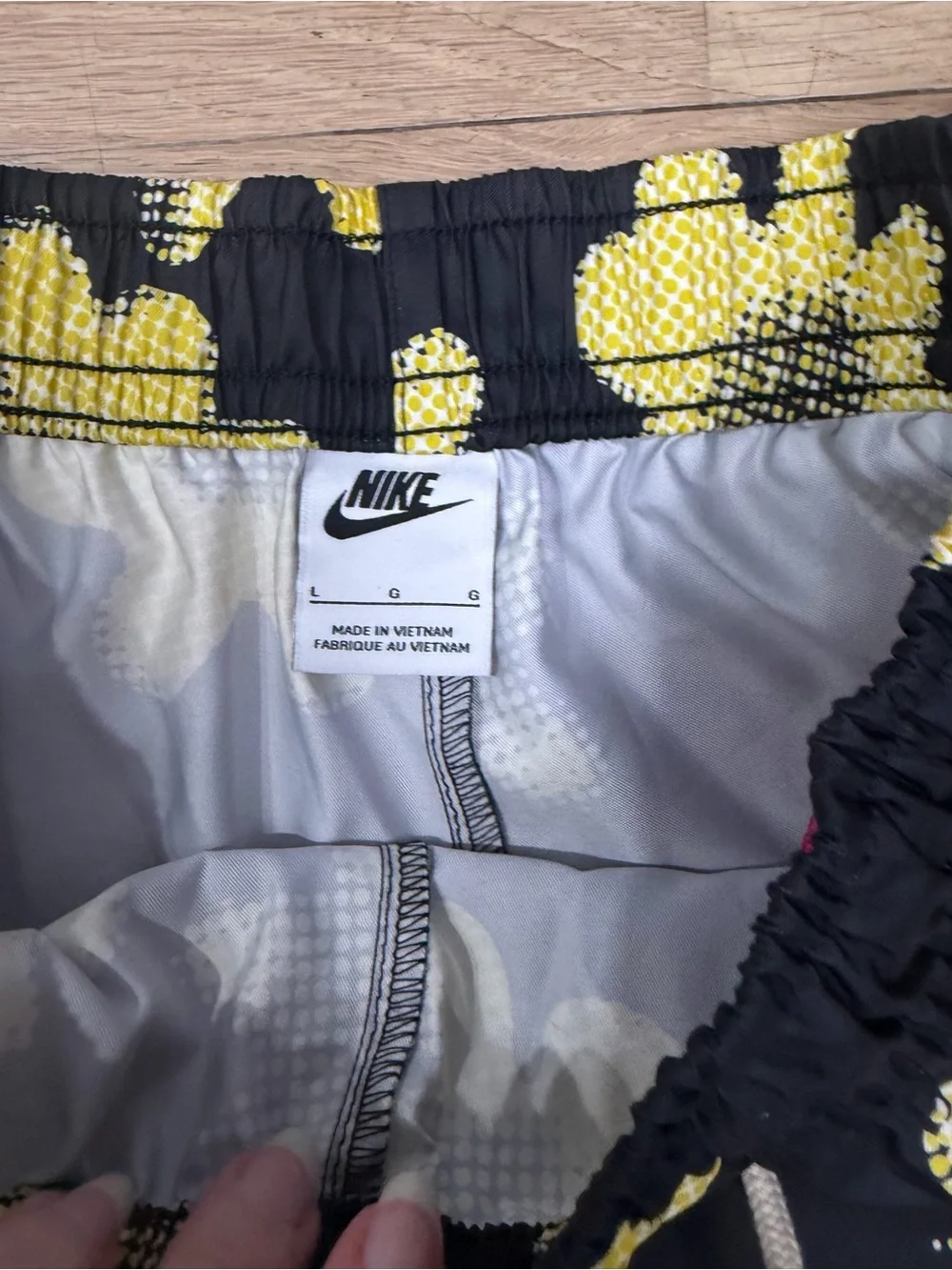 Nike Black Floral Track Pants with Yellow Print and Pink Side Stripe